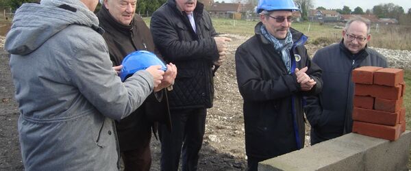 Pose de la 1ère pierre